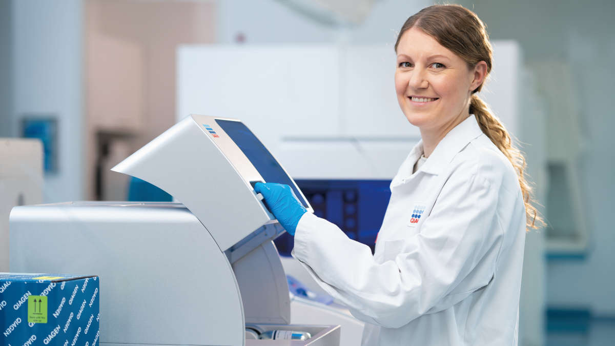 smiling woman in lab