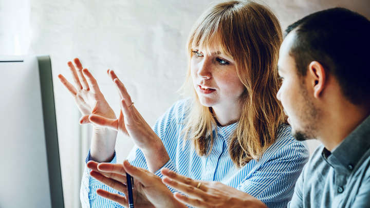 people in front of the screen