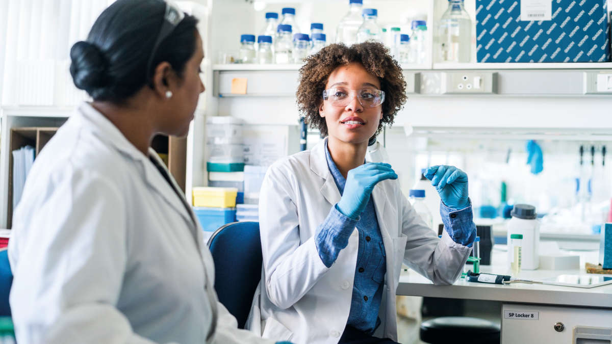 people working in a laboratory, conversation, talk