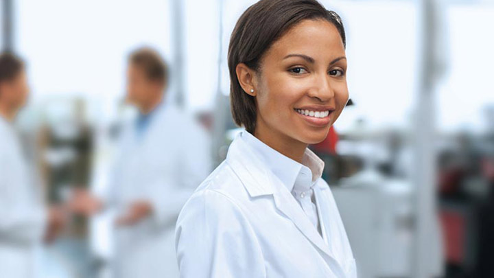 woman in lab coat