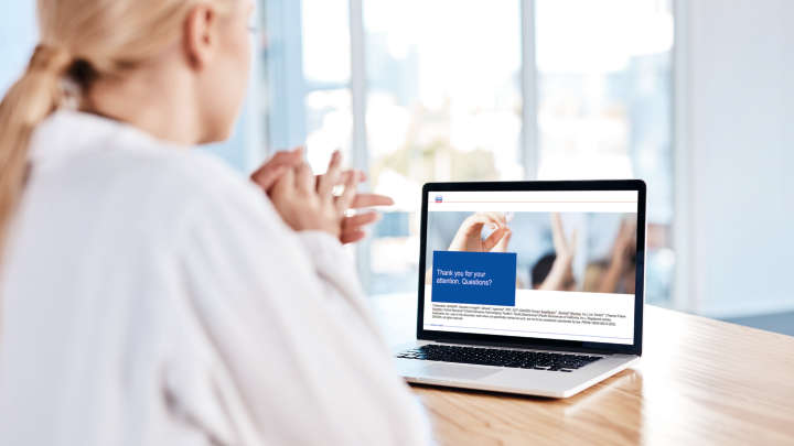 Young scientist having a webinar with a laptop in a office