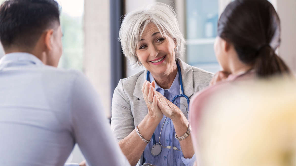 Blood cancer content world, female doctor talking to patient, Clinical genomics, oncology