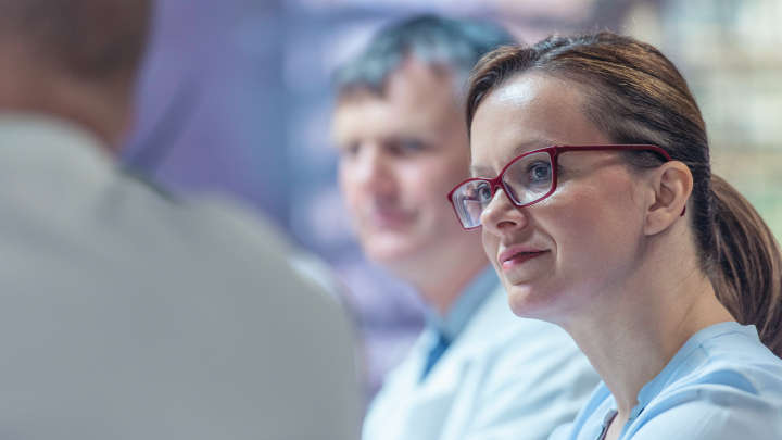 Medical doctor team at a meeting having conversation.