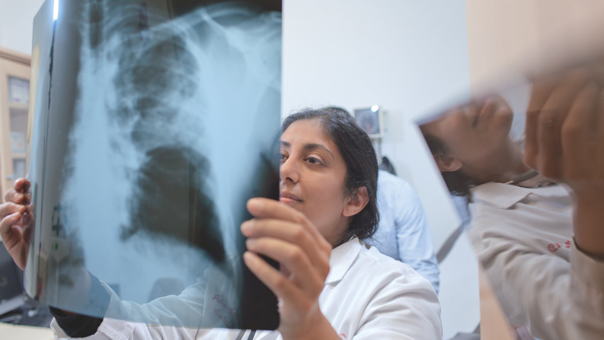 Tuberculosis test, QuantiFERON (QFT), Dr. Amee Patrawallatreats tuberculosis patients, including latent TB infections identified by QuantiFERON-TB Gold In-Tube, in Newark, New Jersey. 11/2015, (Person/s, Photography, MDx, Doctor/Physician, Patient, Doctors office, Hospital, QuantiFERON/Prevention (QFT))