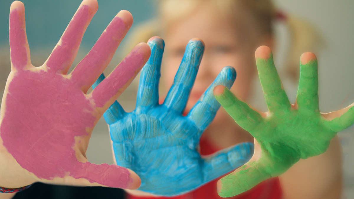Colored hands as sign for rare disease day