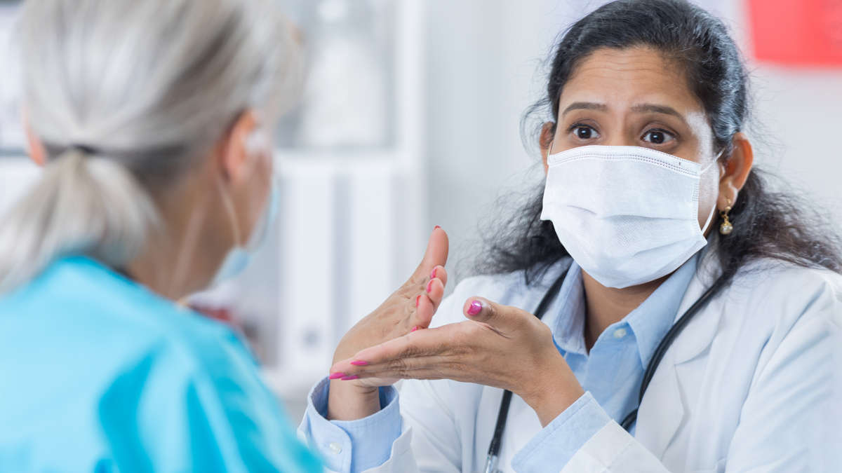 Female indian doctor, consulting