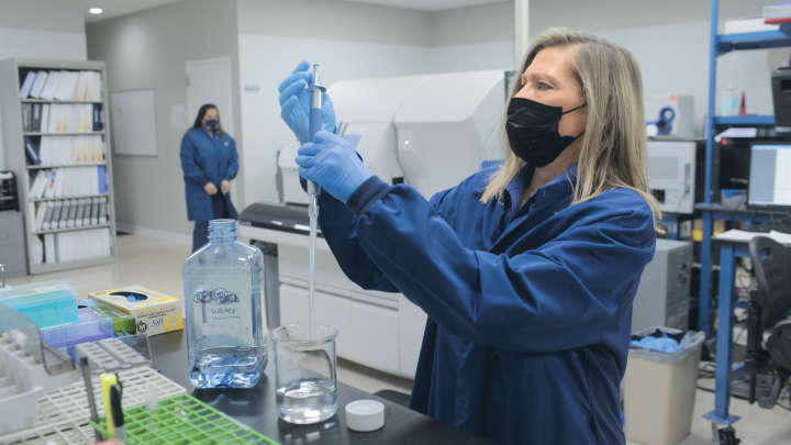 scientist studying samples